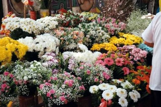 Seasonal bouquet in foreground